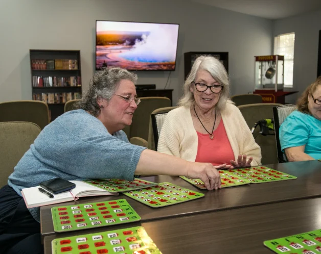 BellevueNeese-Residents-3-2 senior citizen playing board games